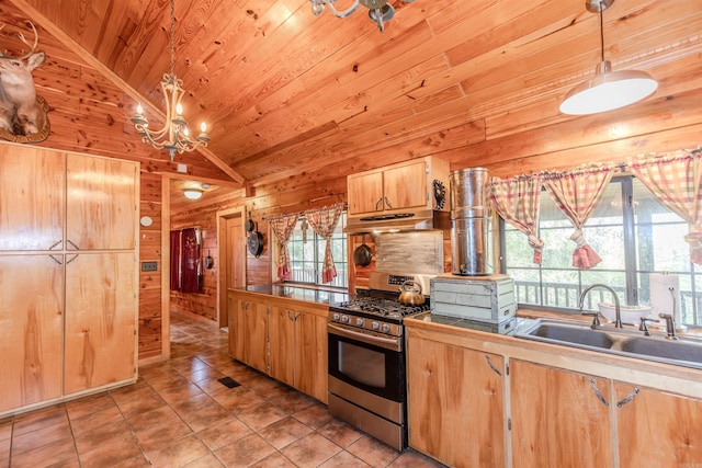 208 Mountain Dr, Perryville, AR 72126 - kitchen with wooden ceiling, a sink, under cabinet range hood, wood walls, and stainless steel gas range oven