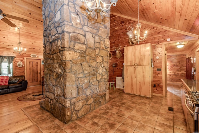 208 Mountain Dr, Perryville, AR 72126 - interior space featuring high vaulted ceiling, wooden walls, and wood ceiling