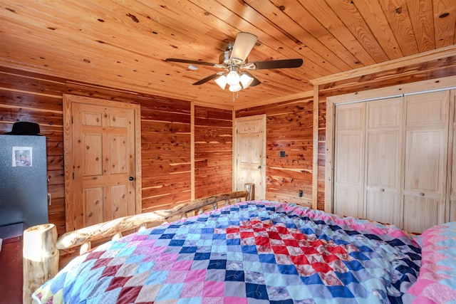 208 Mountain Dr, Perryville, AR 72126 - bedroom featuring wooden walls, wood ceiling, and a ceiling fan