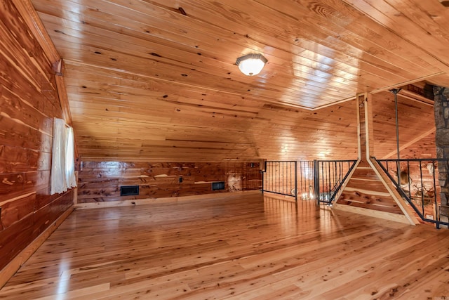 208 Mountain Dr, Perryville, AR 72126 - bonus room featuring wood walls, vaulted ceiling, hardwood / wood-style flooring, and wood ceiling