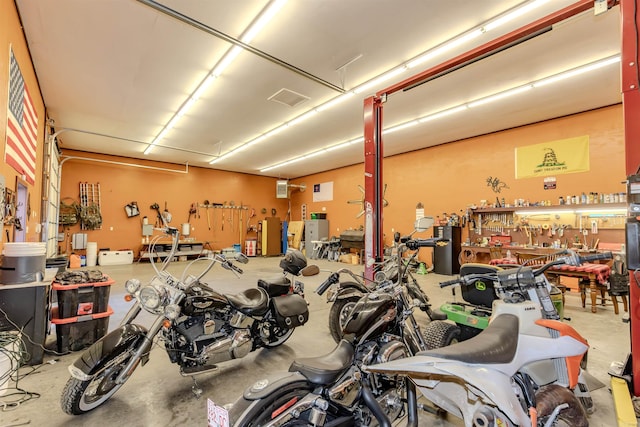 208 Mountain Dr, Perryville, AR 72126 - garage featuring a workshop area