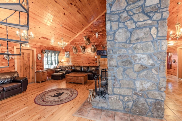 208 Mountain Dr, Perryville, AR 72126 - living area featuring a chandelier, wood walls, and wood ceiling