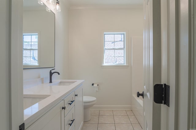 bathroom with tile patterned floors, a healthy amount of sunlight, a sink, and ornamental molding