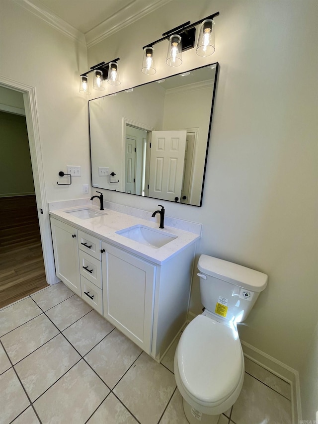 full bathroom with tile patterned floors, double vanity, a sink, and ornamental molding