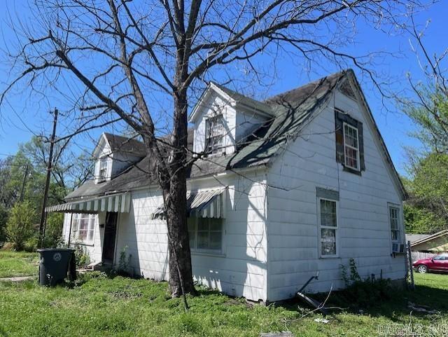 508 W Woodruff Ave, Searcy, AR 72143 - view of home's exterior featuring a yard