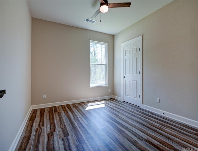 341 Diamondhead Dr, Hot Springs, AR 71913 - unfurnished bedroom with visible vents, baseboards, a ceiling fan, and dark wood finished floors