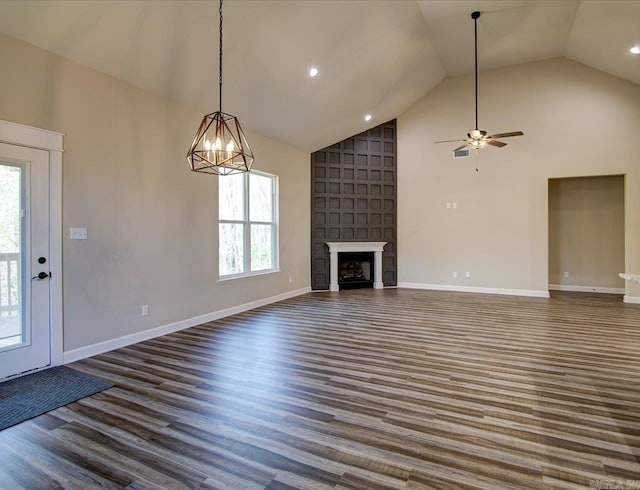 341 Diamondhead Dr, Hot Springs, AR 71913 - unfurnished living room featuring baseboards, a fireplace, a ceiling fan, dark wood finished floors, and high vaulted ceiling