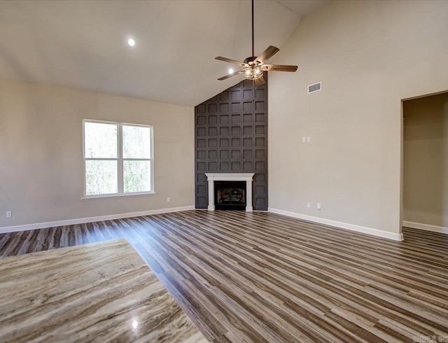 341 Diamondhead Dr, Hot Springs, AR 71913 - unfurnished living room with baseboards, a ceiling fan, visible vents, high vaulted ceiling, and wood finished floors