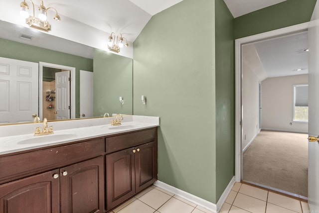 bathroom featuring a sink, tile patterned flooring, and visible vents