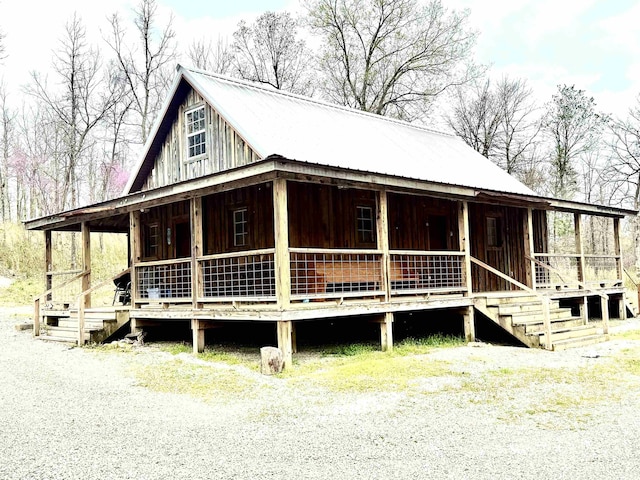 view of front of property with metal roof and covered porch