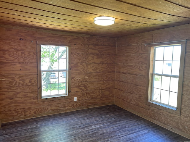 604 E Church St, Morrilton, AR 72110 - spare room featuring wood ceiling and dark wood finished floors