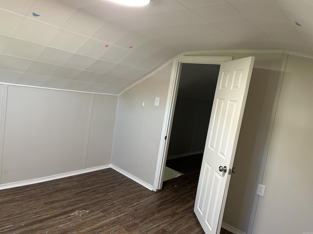 604 E Church St, Morrilton, AR 72110 - additional living space with dark wood-style flooring, baseboards, and lofted ceiling