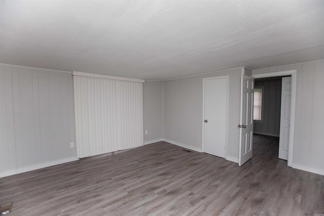 301 Boggs St, North Little Rock, AR 72117 - spare room featuring wood finished floors