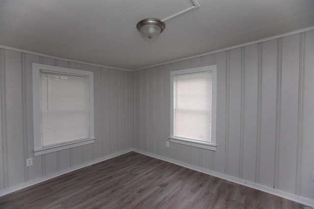 301 Boggs St, North Little Rock, AR 72117 - spare room featuring wood finished floors