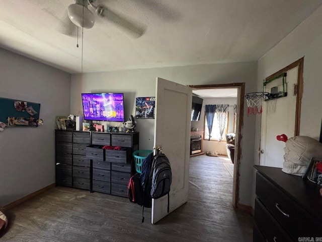 95 Terrafirma Ln, Ash Flat, AR 72513 - bedroom featuring baseboards, a ceiling fan, and wood finished floors