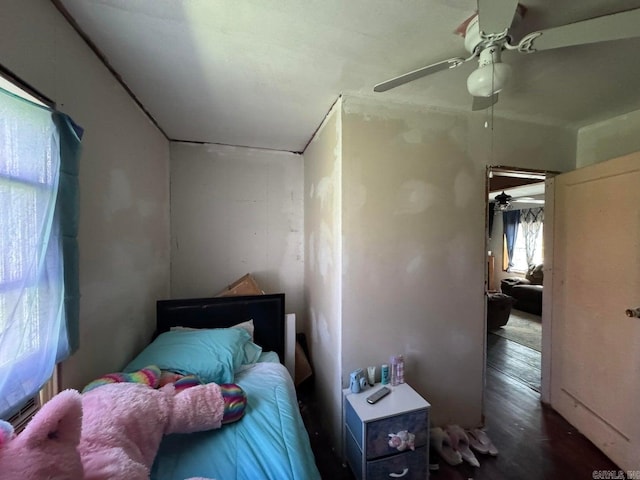 95 Terrafirma Ln, Ash Flat, AR 72513 - bedroom with ceiling fan and wood finished floors