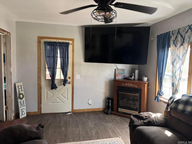 95 Terrafirma Ln, Ash Flat, AR 72513 - living area featuring a fireplace, baseboards, wood finished floors, and ceiling fan