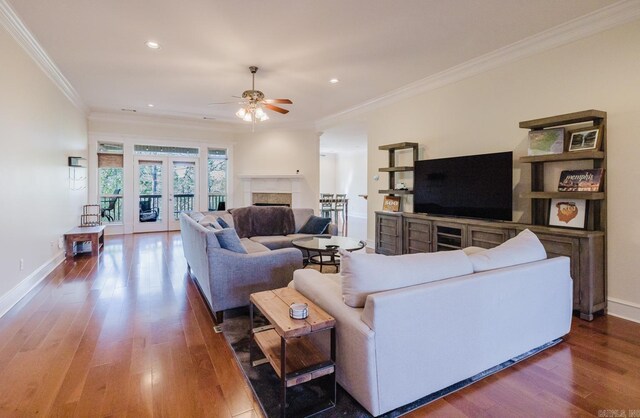 3015 Woodsgate, Little Rock, AR 72211 - living area with wood finished floors, a fireplace, ornamental molding, and ceiling fan