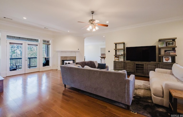 3015 Woodsgate, Little Rock, AR 72211 - living room featuring crown molding, ceiling fan, a fireplace, recessed lighting, and wood finished floors