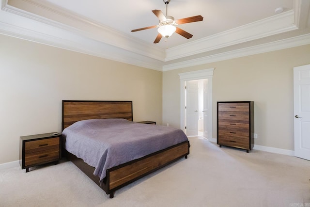 3015 Woodsgate, Little Rock, AR 72211 - bedroom featuring baseboards, ornamental molding, a tray ceiling, ceiling fan, and light colored carpet