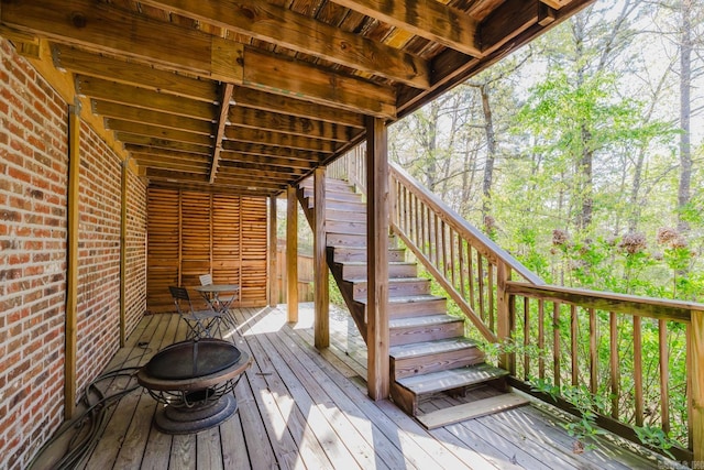 3015 Woodsgate, Little Rock, AR 72211 - wooden deck featuring stairs and an outdoor fire pit