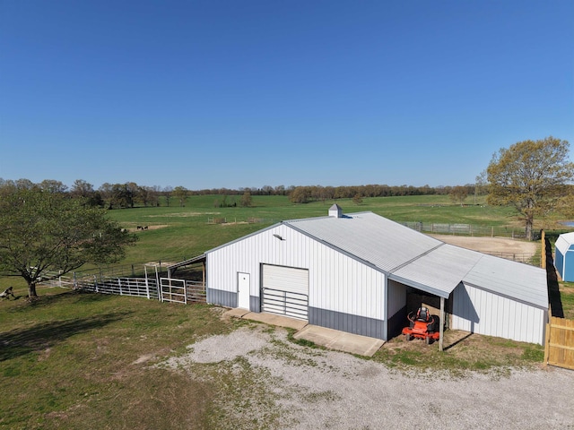 2832 Lacrosse Rd, Melbourne, AR 72556 - view of pole building with fence, driveway, and a rural view