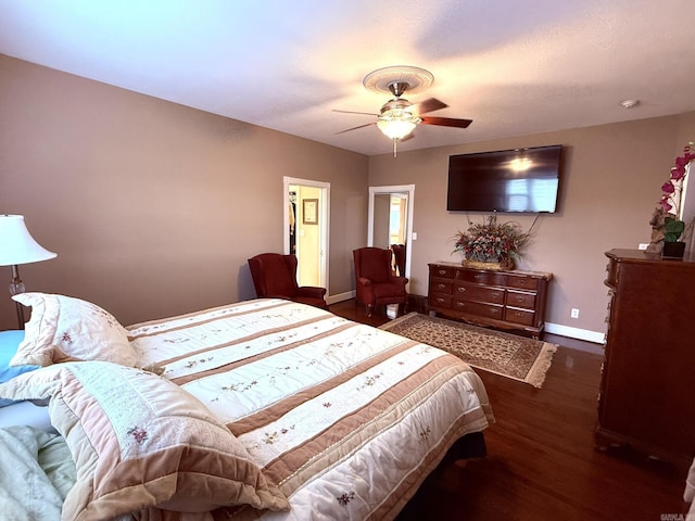 2832 Lacrosse Rd, Melbourne, AR 72556 - bedroom featuring baseboards, a ceiling fan, and wood finished floors