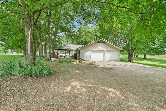 110 N Horatio Homesites Rd, Horatio, AR 71842 - view of front of property featuring a front lawn, a garage, and driveway