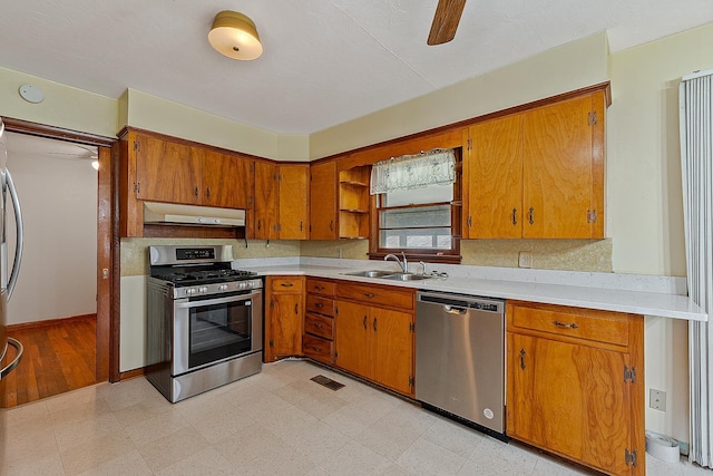 2812 N Church, Jonesboro, AR 72401 - kitchen featuring light floors, visible vents, appliances with stainless steel finishes, under cabinet range hood, and a sink
