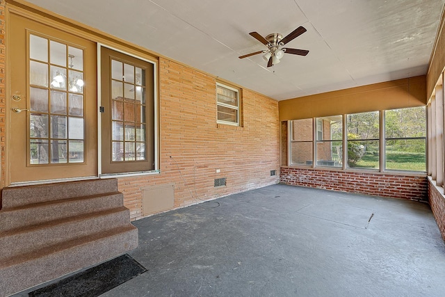 2812 N Church, Jonesboro, AR 72401 - unfurnished sunroom with brick wall
