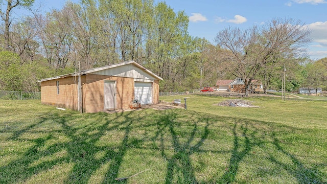 2812 N Church, Jonesboro, AR 72401 - view of yard featuring a garage, an outdoor structure, and fence