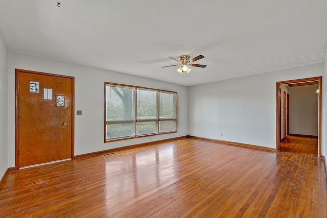 2812 N Church, Jonesboro, AR 72401 - interior space with visible vents, baseboards, a ceiling fan, and hardwood / wood-style floors