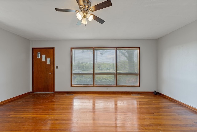 2812 N Church, Jonesboro, AR 72401 - interior space featuring visible vents, ceiling fan, wood finished floors, and baseboards
