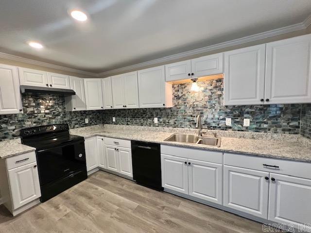 131 Maribeth St, Forrest City, AR 72335 - kitchen featuring white cabinets, exhaust hood, a sink, and black appliances