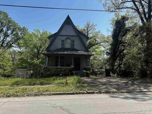 3419 Dr Martin Luther King Dr, Little Rock, AR 72206 - victorian-style house with covered porch and fence