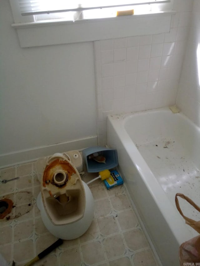 3419 Dr Martin Luther King Dr, Little Rock, AR 72206 - full bathroom featuring a bath, tile patterned floors, and a wealth of natural light