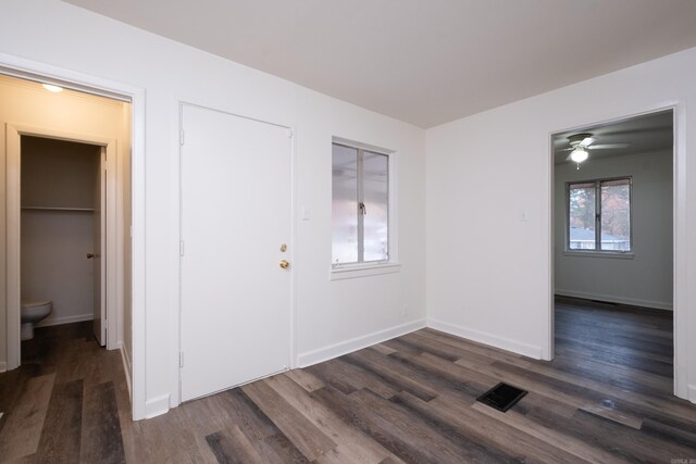 77 Broadmoor Dr, Little Rock, AR 72204 - interior space with visible vents, dark wood-style flooring, baseboards, and ceiling fan