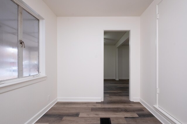 77 Broadmoor Dr, Little Rock, AR 72204 - empty room with visible vents, baseboards, and wood finished floors