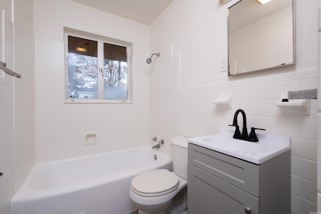77 Broadmoor Dr, Little Rock, AR 72204 - bathroom with vanity, a wainscoted wall, toilet, shower / bathtub combination, and tile walls