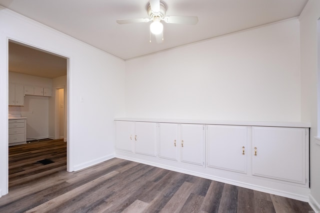 77 Broadmoor Dr, Little Rock, AR 72204 - spare room with dark wood-type flooring, baseboards, and a ceiling fan