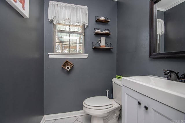 3712 Hazelwood Dr, Benton, AR 72015 - bathroom featuring toilet, tile patterned floors, vanity, and baseboards