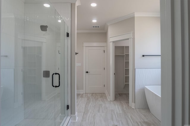 240 Michelle Dr, Beebe, AR 72012 - full bath with a freestanding bath, a walk in closet, ornamental molding, and a stall shower