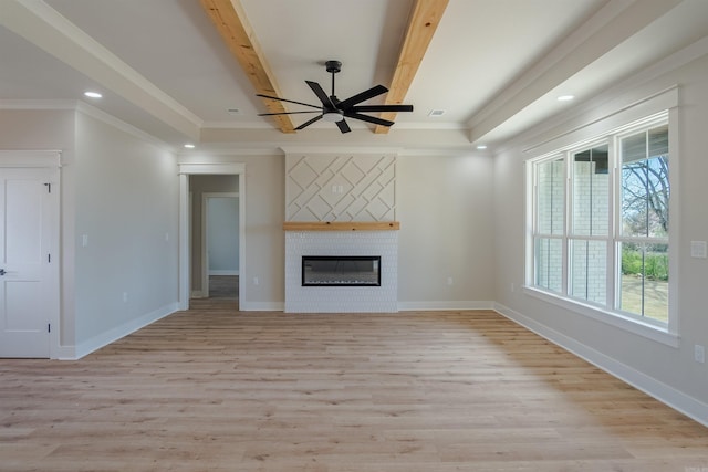 240 Michelle Dr, Beebe, AR 72012 - unfurnished living room featuring light wood-type flooring, a fireplace, a ceiling fan, and recessed lighting
