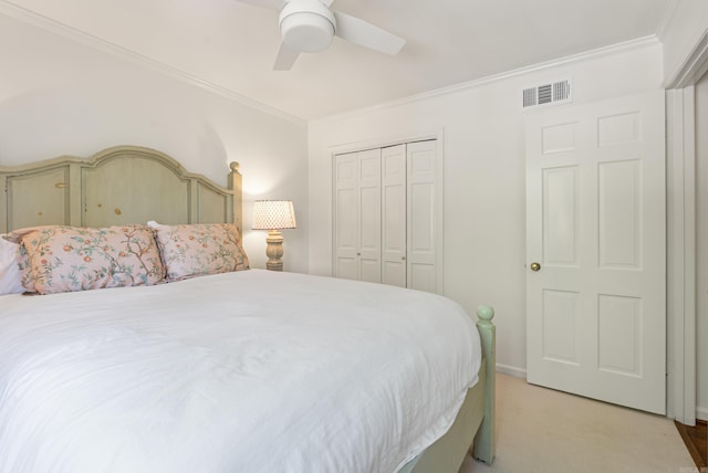 5 Huntington Rd, Little Rock, AR 72227 - bedroom featuring a closet, ceiling fan, ornamental molding, carpet flooring, and visible vents