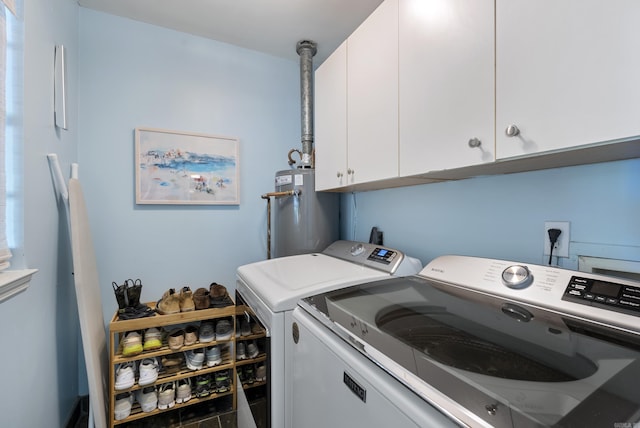 5 Huntington Rd, Little Rock, AR 72227 - washroom with water heater, independent washer and dryer, and cabinet space