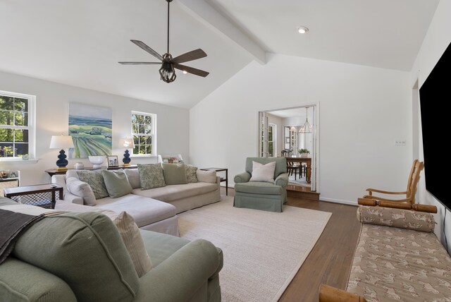 5 Huntington Rd, Little Rock, AR 72227 - living area with plenty of natural light, wood finished floors, beam ceiling, and ceiling fan
