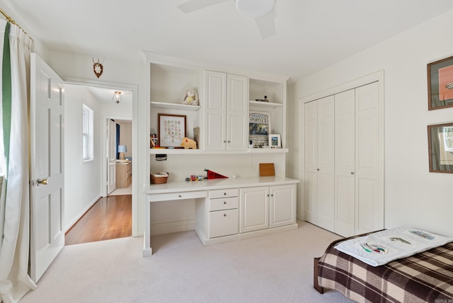 5 Huntington Rd, Little Rock, AR 72227 - bedroom with ceiling fan, light carpet, a closet, and built in desk