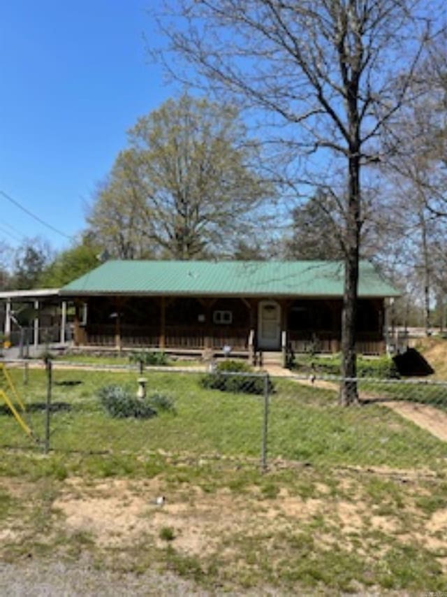 view of front of house with an exterior structure and an outdoor structure