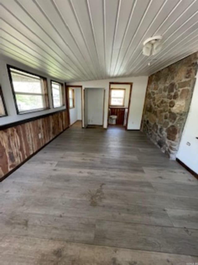 unfurnished living room featuring wood finished floors