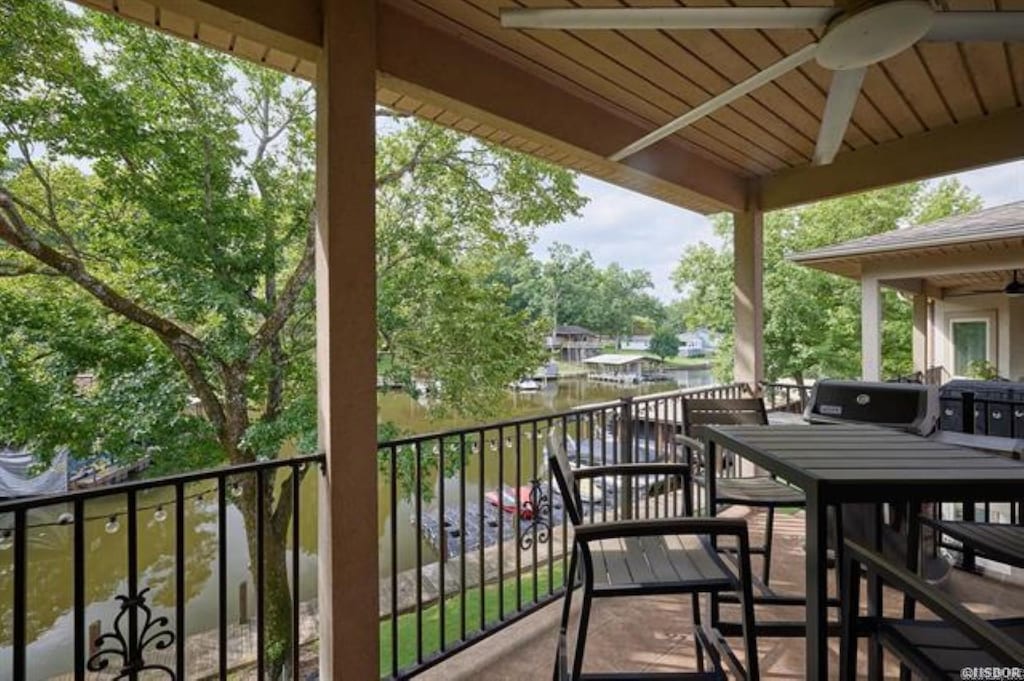 1133 Airport Rd Unit B4, Hot Springs, AR 71913 - balcony featuring a water view and ceiling fan